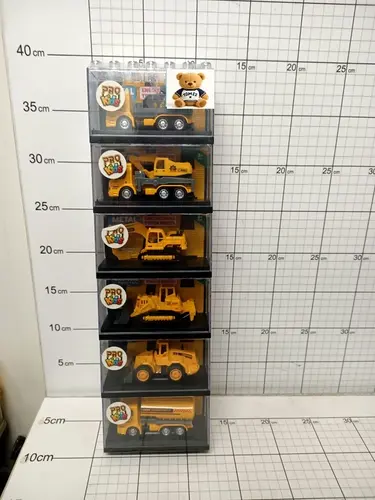 AUTKO W KLOCKU 1:64 BUDOWLANE ŻÓŁTE     OP-6,CENA ZA 1 SZT!!!! 5903943012954