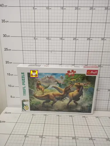 PUZZLE 160 WALCZACE TYRANOZAURY TREFL   KK5900511153606