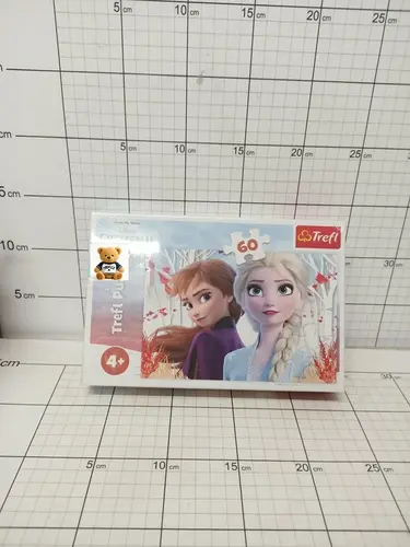 PUZZLE 60 ZACZAROWANY ŚWIAT ANNY I ELSY TREFL 5900511173338