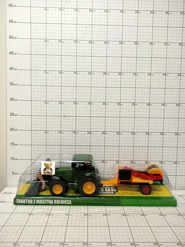 TRAKTOR Z MASZYNĄ ROLNICZĄ              5900949484334