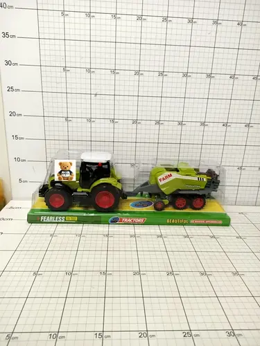 TRAKTOR Z MASZYNĄ ROLNICZĄ              5903940010434