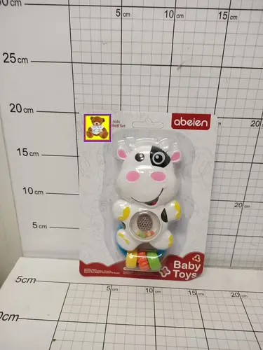 ZABAWKA DLA MALUCHA GRZECHOTKA KROWA    ŚW./DŹW. 5902496197538